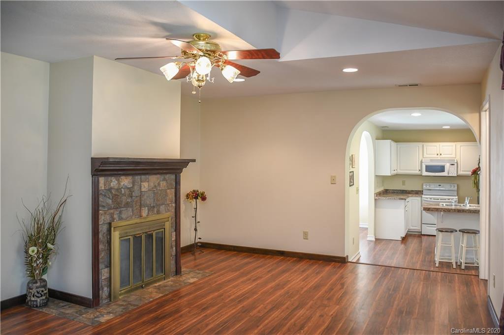 621 Incinerator Road Clyde, NC 28721 - Photo 3 of 27 a view of a livingroom with a fireplace