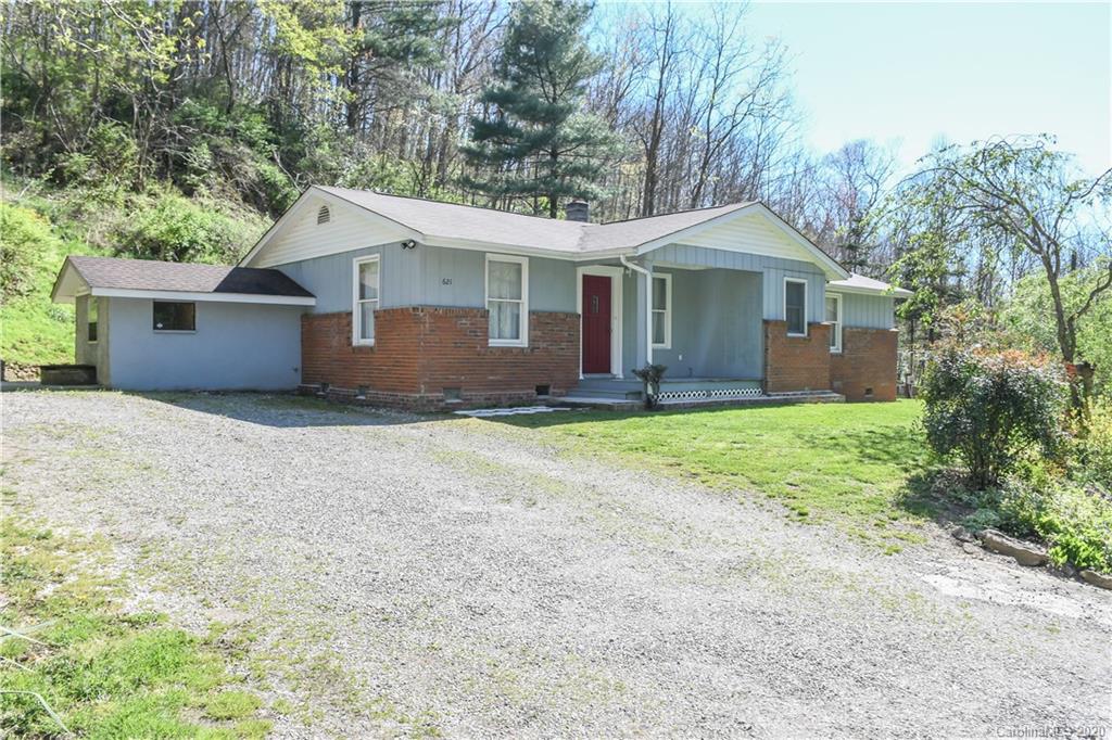 621 Incinerator Road Clyde, NC 28721 - Photo 26 of 27 front view of a house with a yard