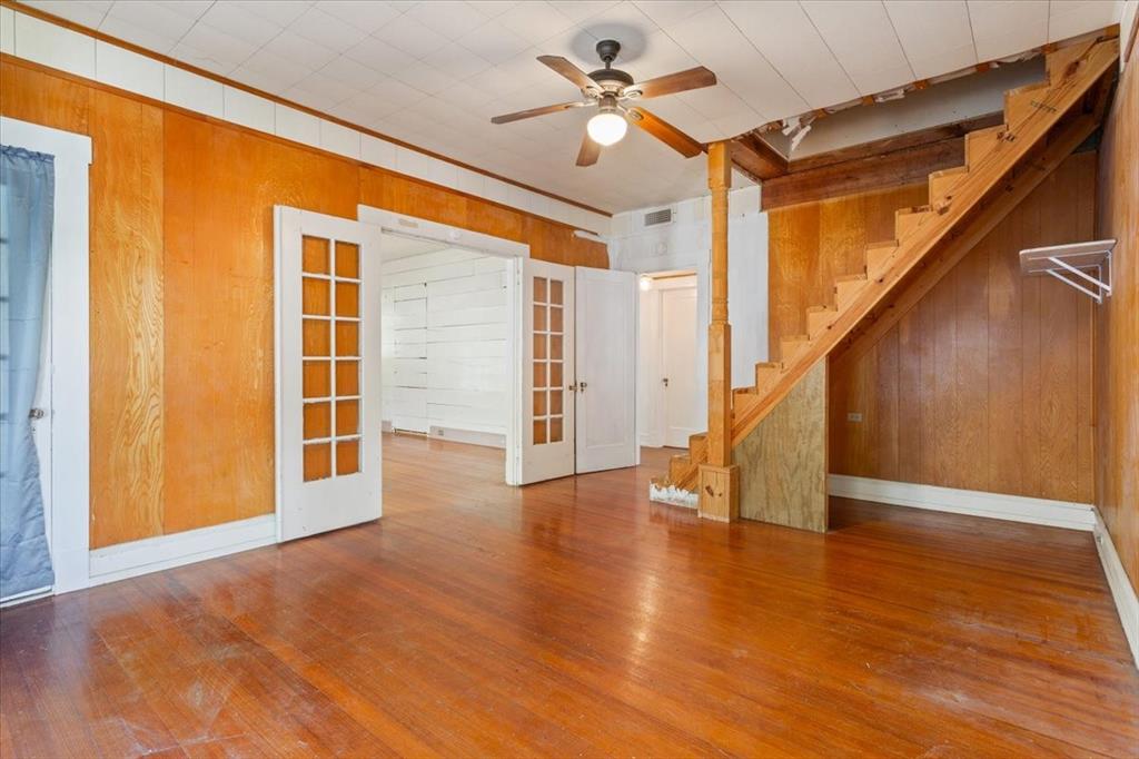 2600 Colcord Avenue Waco, TX 76707 - Photo 11 of 37 a view of an empty room with wooden floor and a window