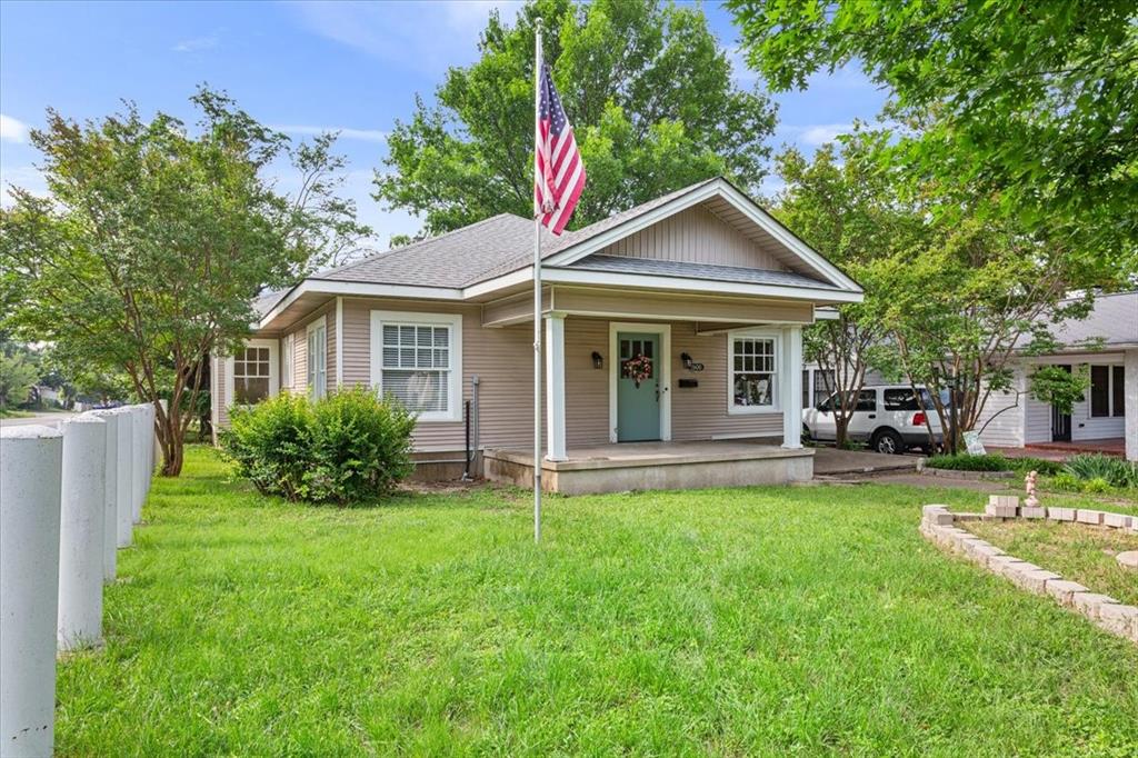 2600 Colcord Avenue Waco, TX 76707 - Photo 2 of 37 a front view of a house with a yard and patio