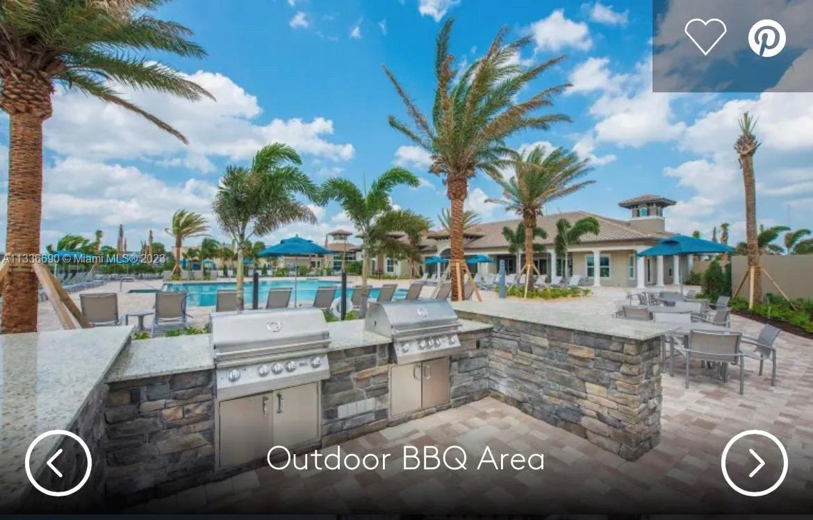 Hillcrest Hollywood, FL 33021 - Photo 23 of 30 a view of multiple house with yard and patio