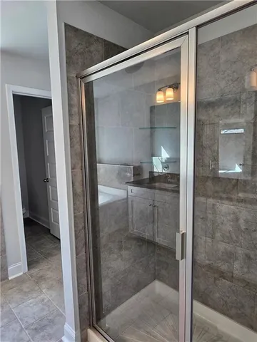 a view of a big yard with an trees