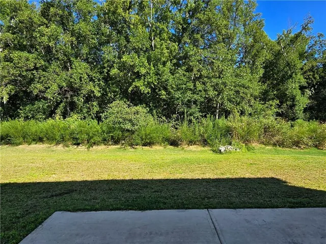 a view of a ocean with a big yard