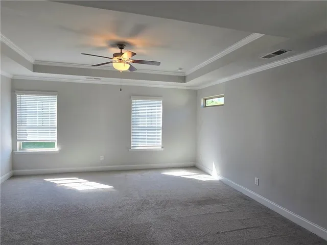 a bathroom with a bathtub sink a mirror and a bathtub