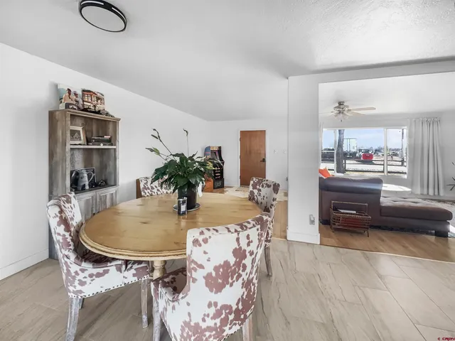 a living room with furniture and a table