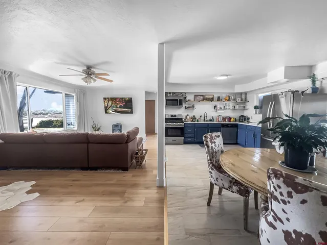 a living room with furniture and window