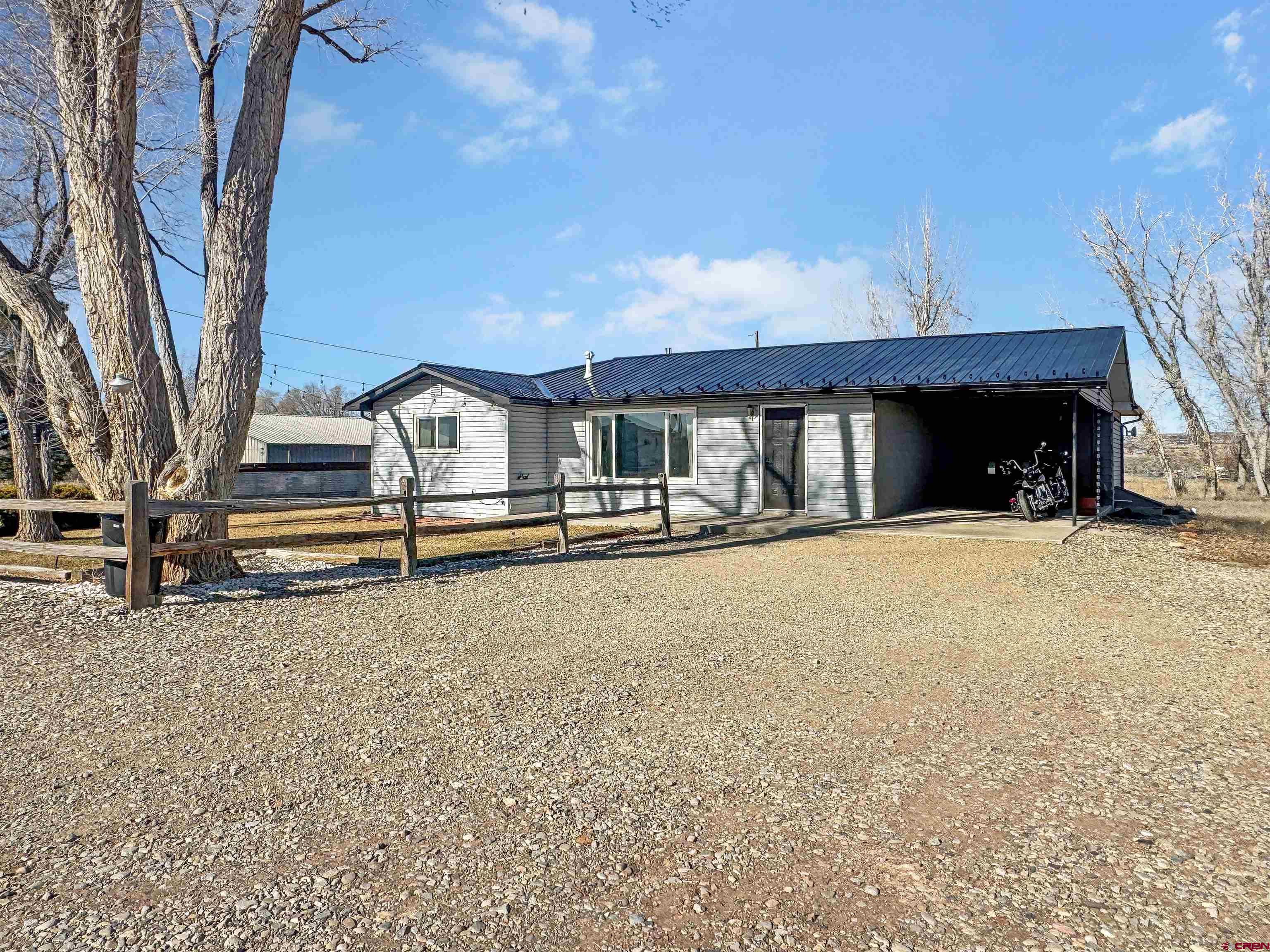 10880 Road 26 Cortez, CO 81321 - Photo 2 of 43 a house view with a outdoor space