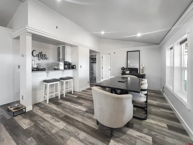 a living room with a couch and a table