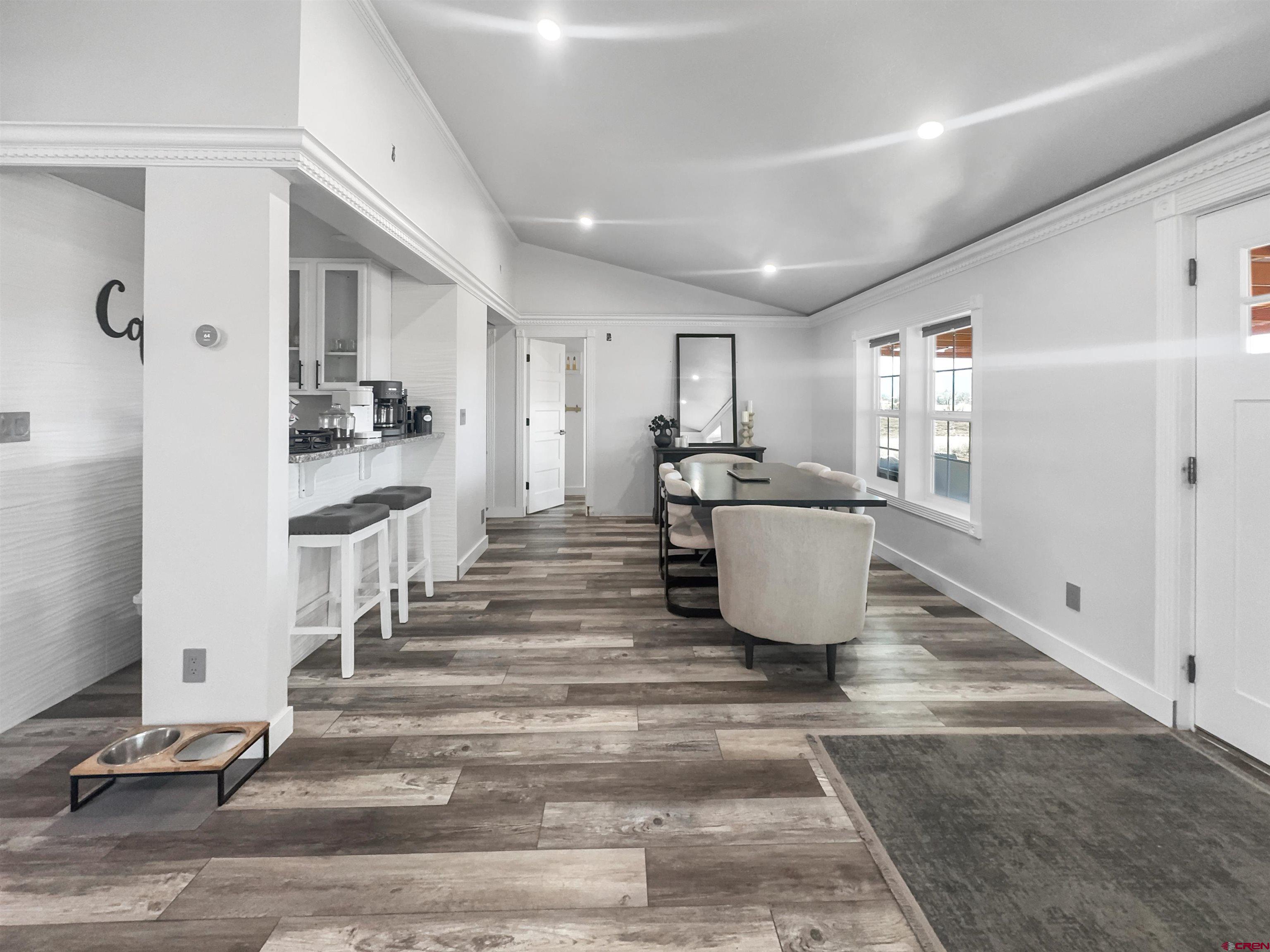 10880 Road 26 Cortez, CO 81321 - Photo 25 of 43 a living room with a furniture and a rug