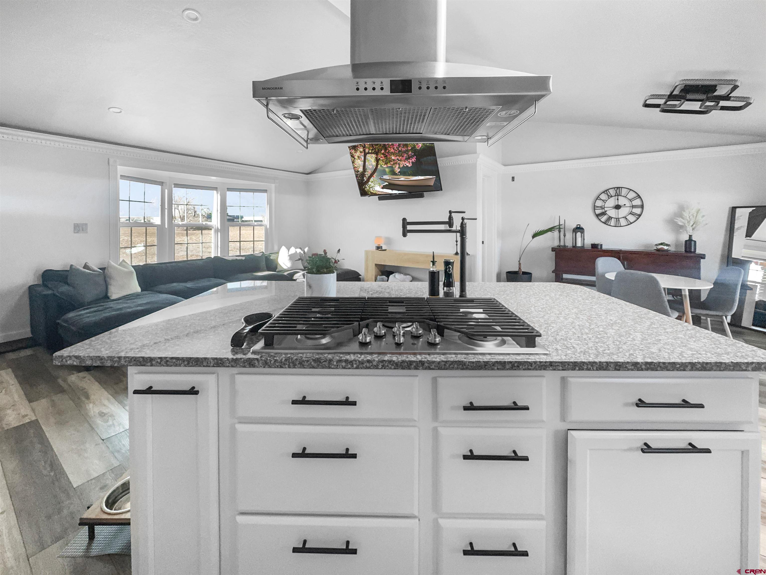 10880 Road 26 Cortez, CO 81321 - Photo 27 of 43 a kitchen with a stove and cabinets