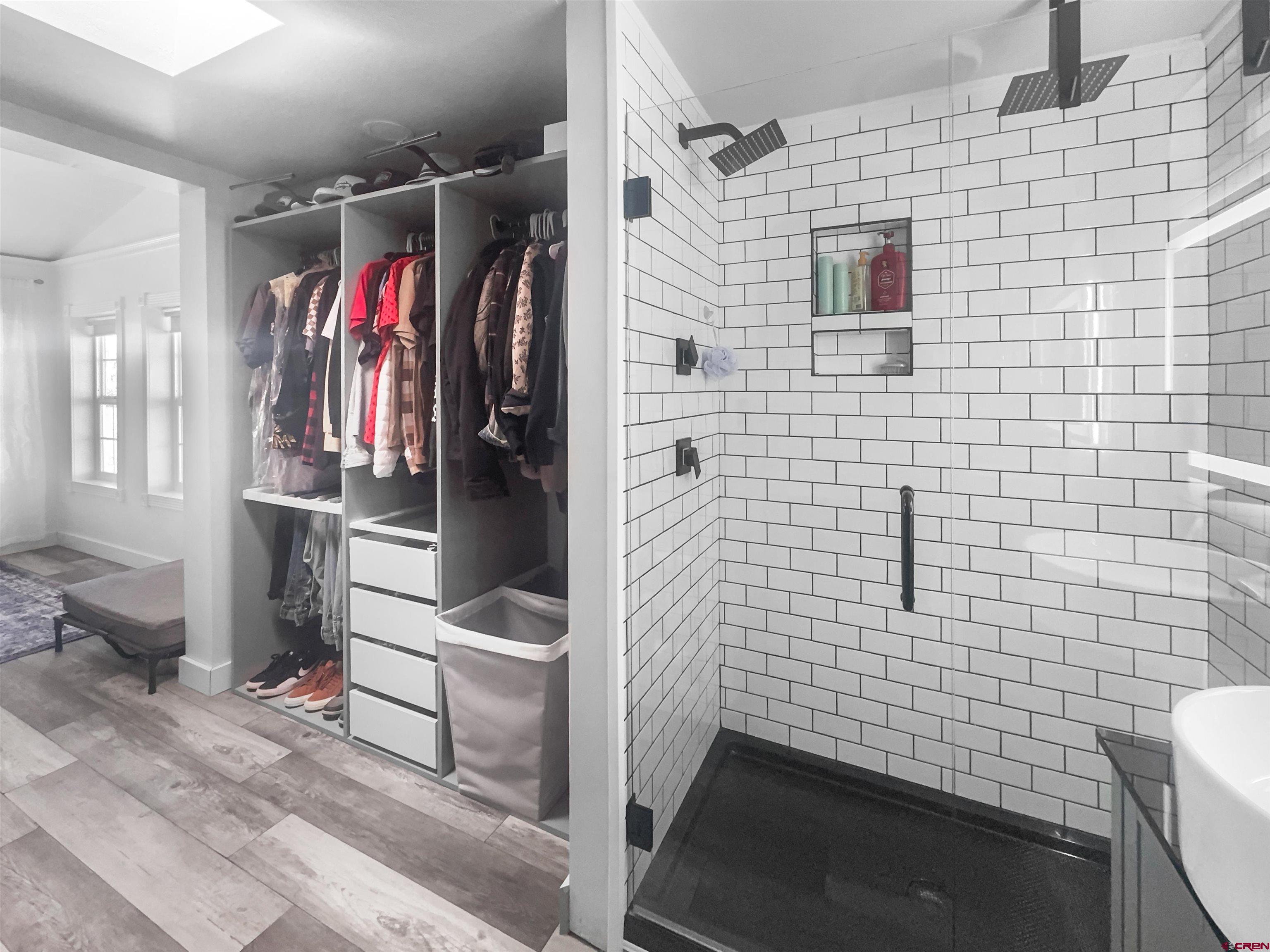 10880 Road 26 Cortez, CO 81321 - Photo 33 of 43 a bathroom with a shower