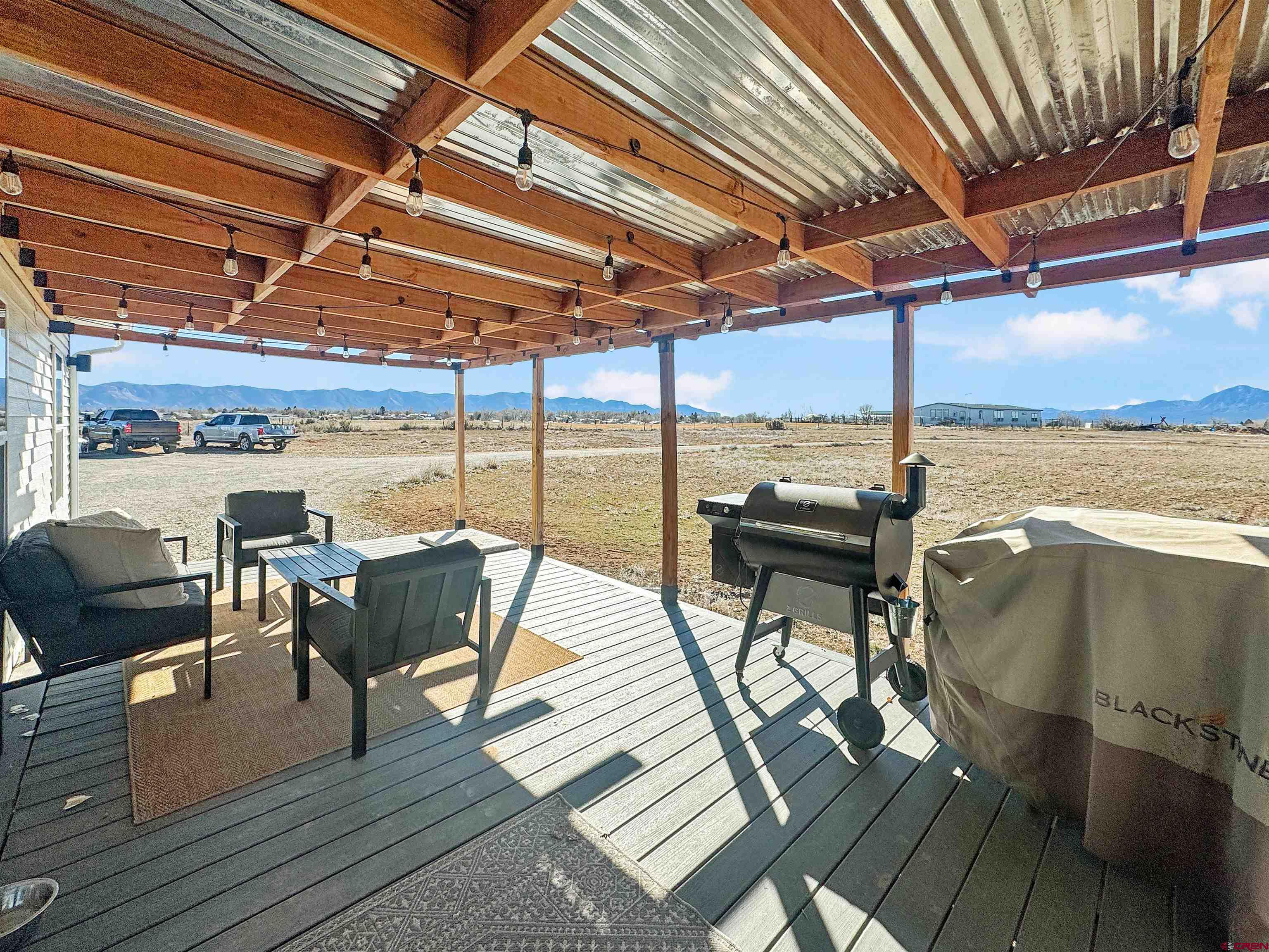 10880 Road 26 Cortez, CO 81321 - Photo 40 of 43 a view of a balcony with wooden floor