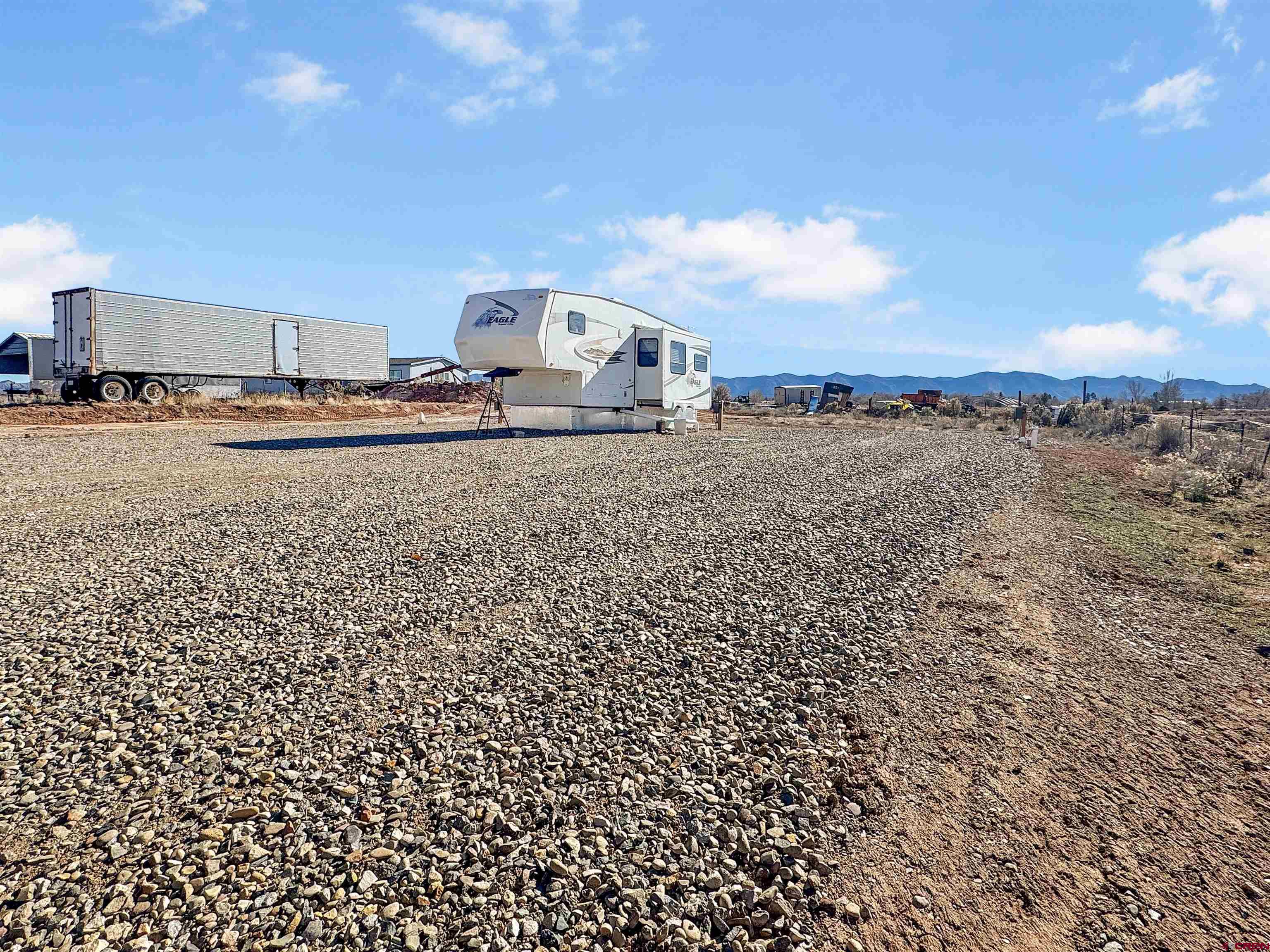 10880 Road 26 Cortez, CO 81321 - Photo 42 of 43 a view of a dry yard with wooden fence
