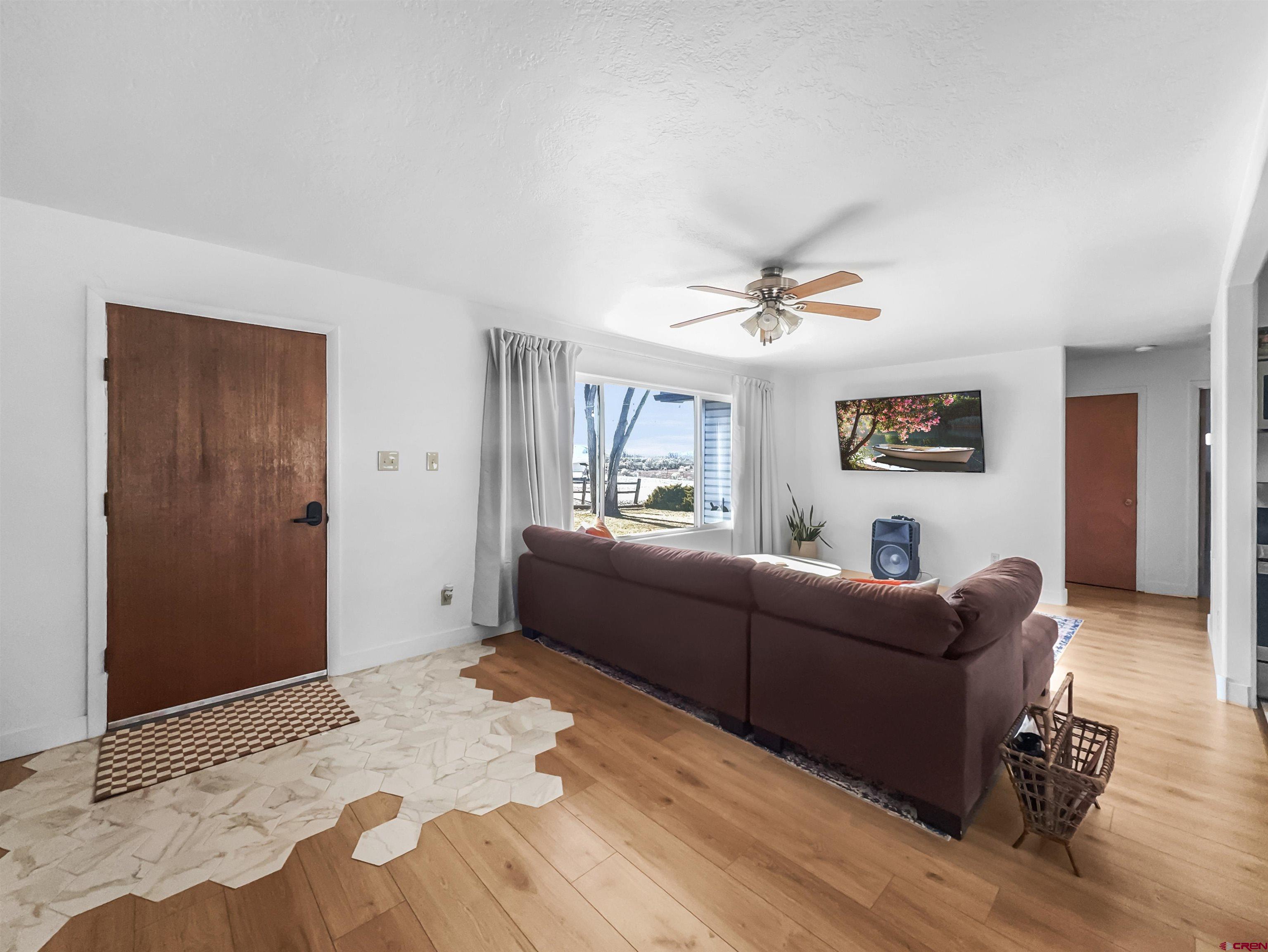 10880 Road 26 Cortez, CO 81321 - Photo 8 of 43 a living room with furniture and a window