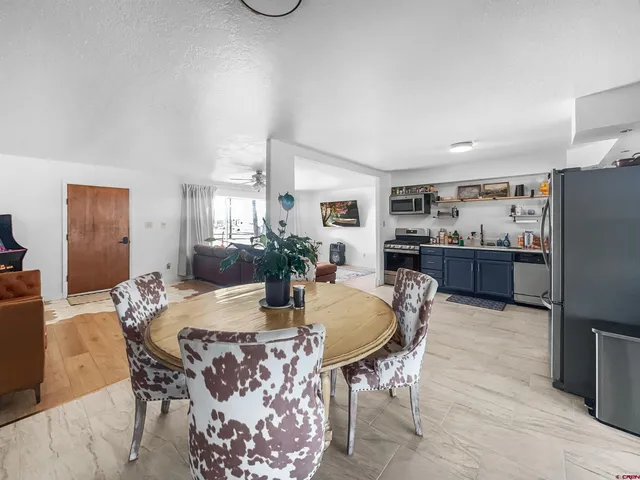 a view of a dining room with furniture