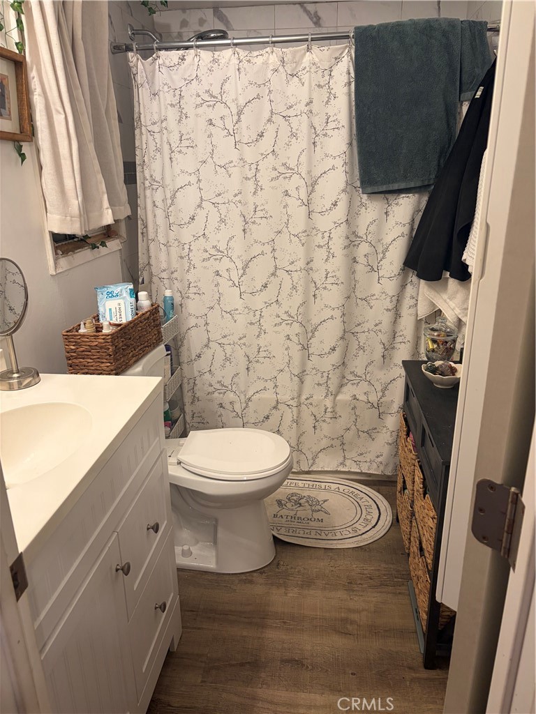 646 El Rancho Drive El Cajon, CA 92019 - Photo 22 of 23 a bathroom with a toilet and a sink