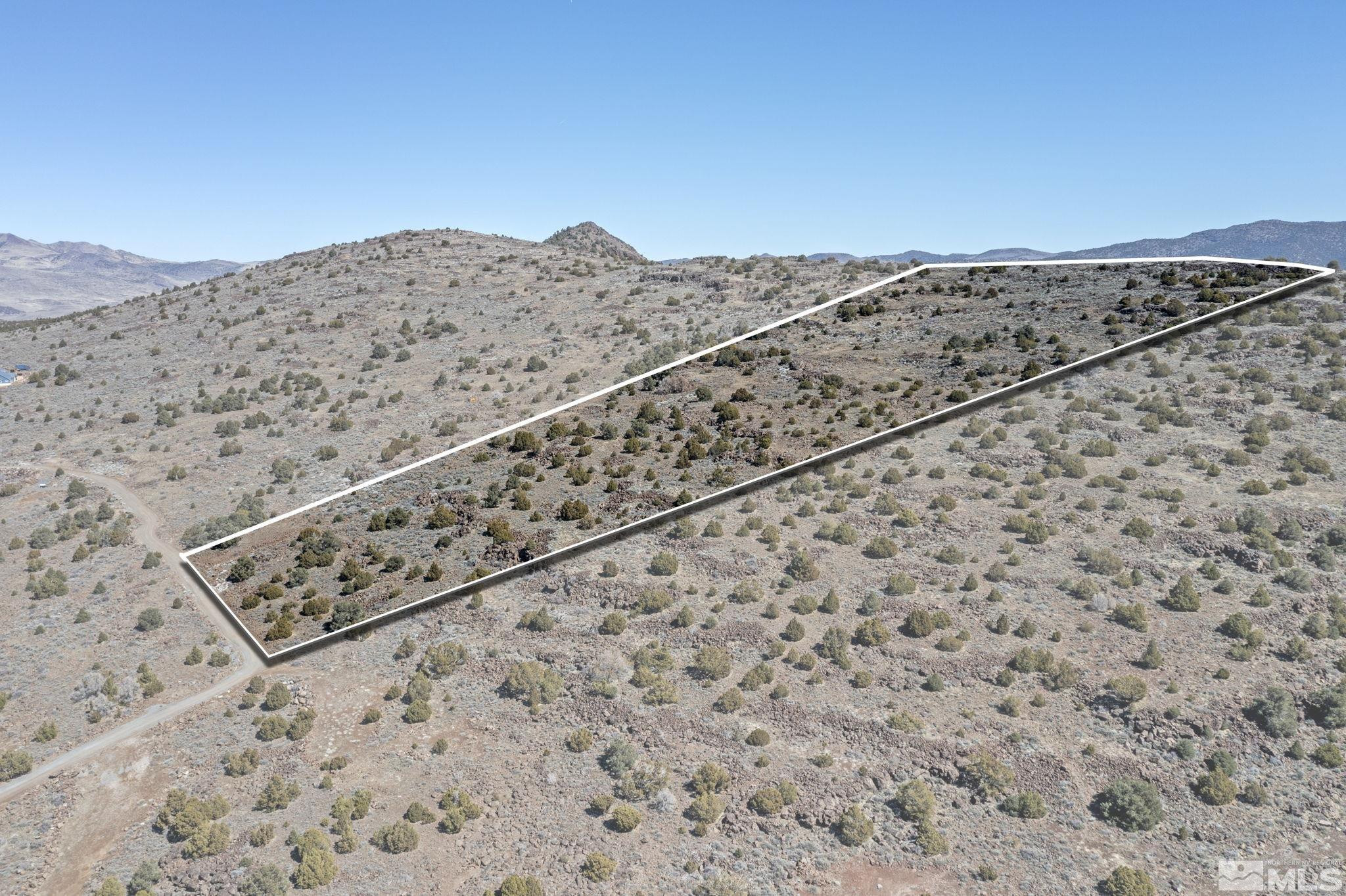3150 Sheridan Road Reno, NV 89521 - Photo 3 of 27 a view of a large mountain with a mountain in the background