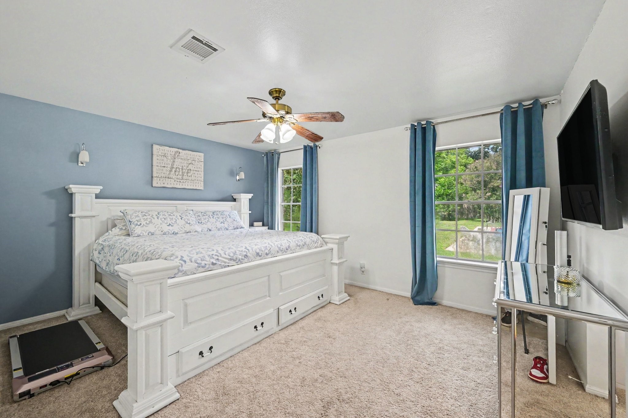 3203 Eula Morgan Road Katy, TX 77493 - Photo 15 of 32 The primary bedroom boasts a view of the peaceful backyard and private pool.