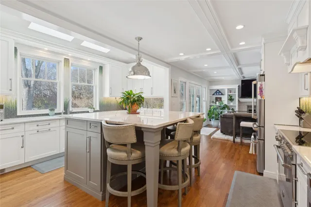 a room with potted plants and wooden floor