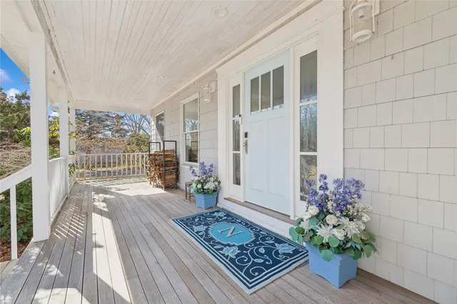 a green field with lots of trees in it