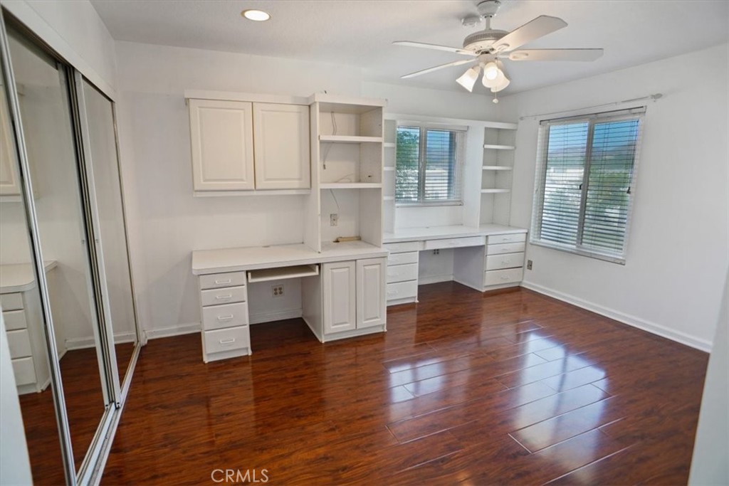 5530 Buffwood Place Agoura Hills, CA 91301 - Photo 18 of 22 a kitchen with stainless steel appliances a stove top oven and a refrigerator
