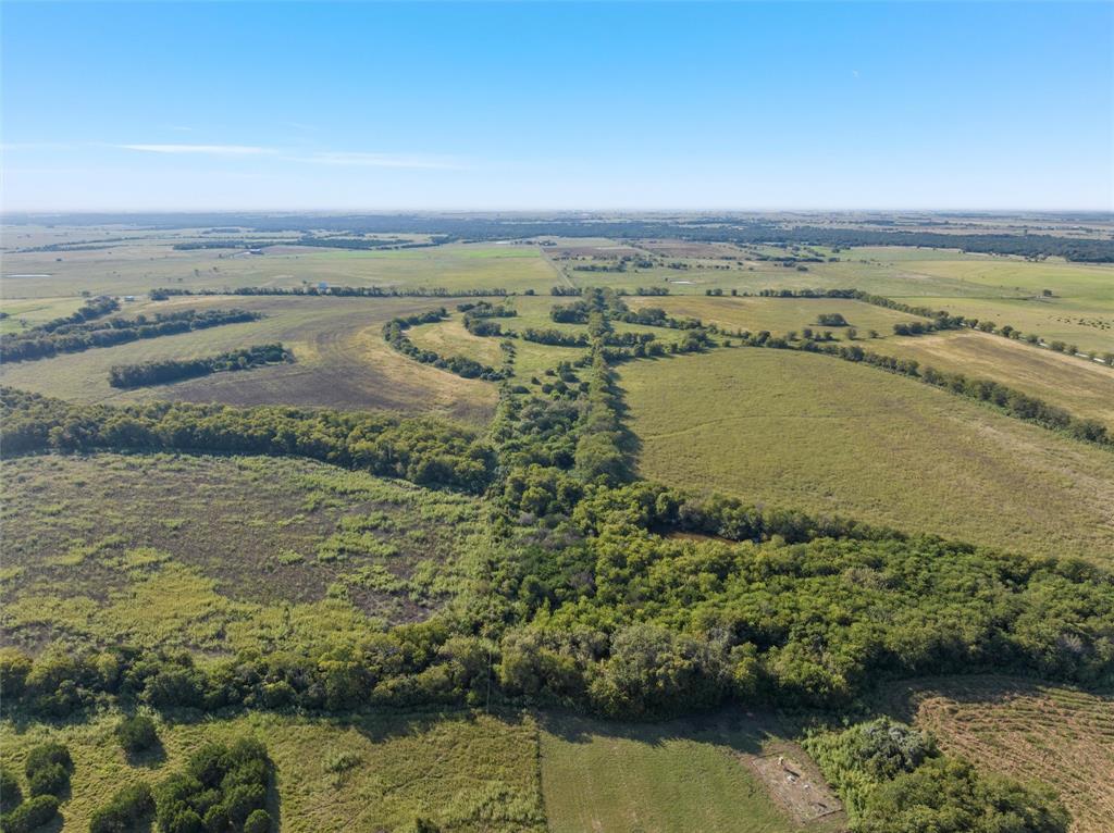 902 Mattlage Road Crawford, TX 76638 - Photo 22 of 30 Aerial overview of property's location featuring rural landscape
