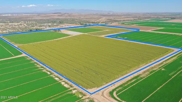 a view of an outdoor space and tennis court