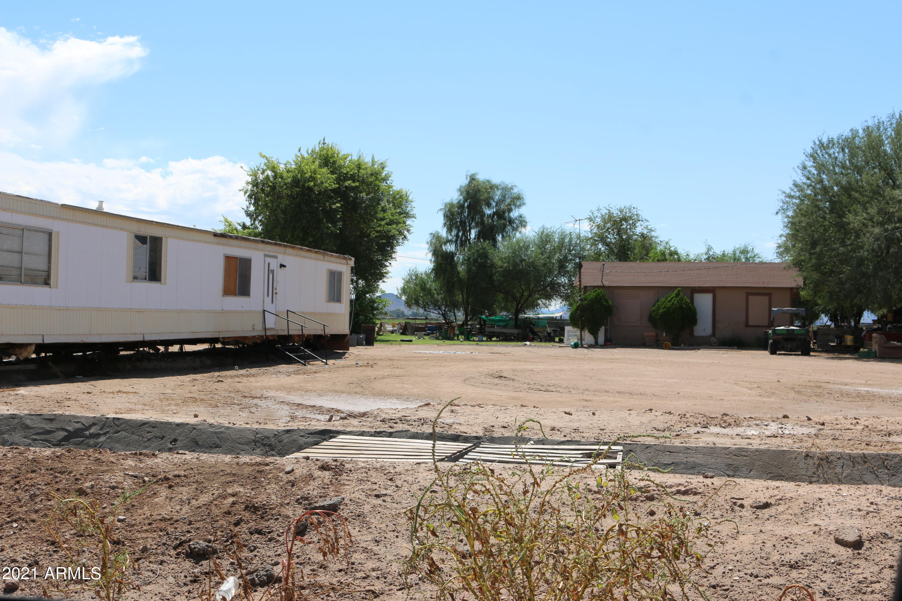 33311 West Ray Road Arlington, AZ 85322 - Photo 10 of 25 a view of a house with a yard
