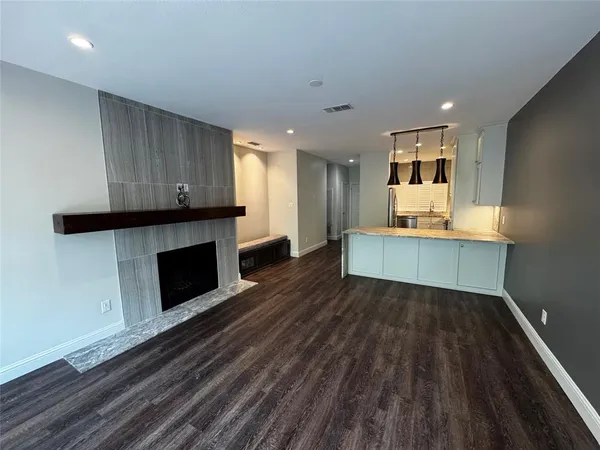 a view of kitchen with microwave and stove