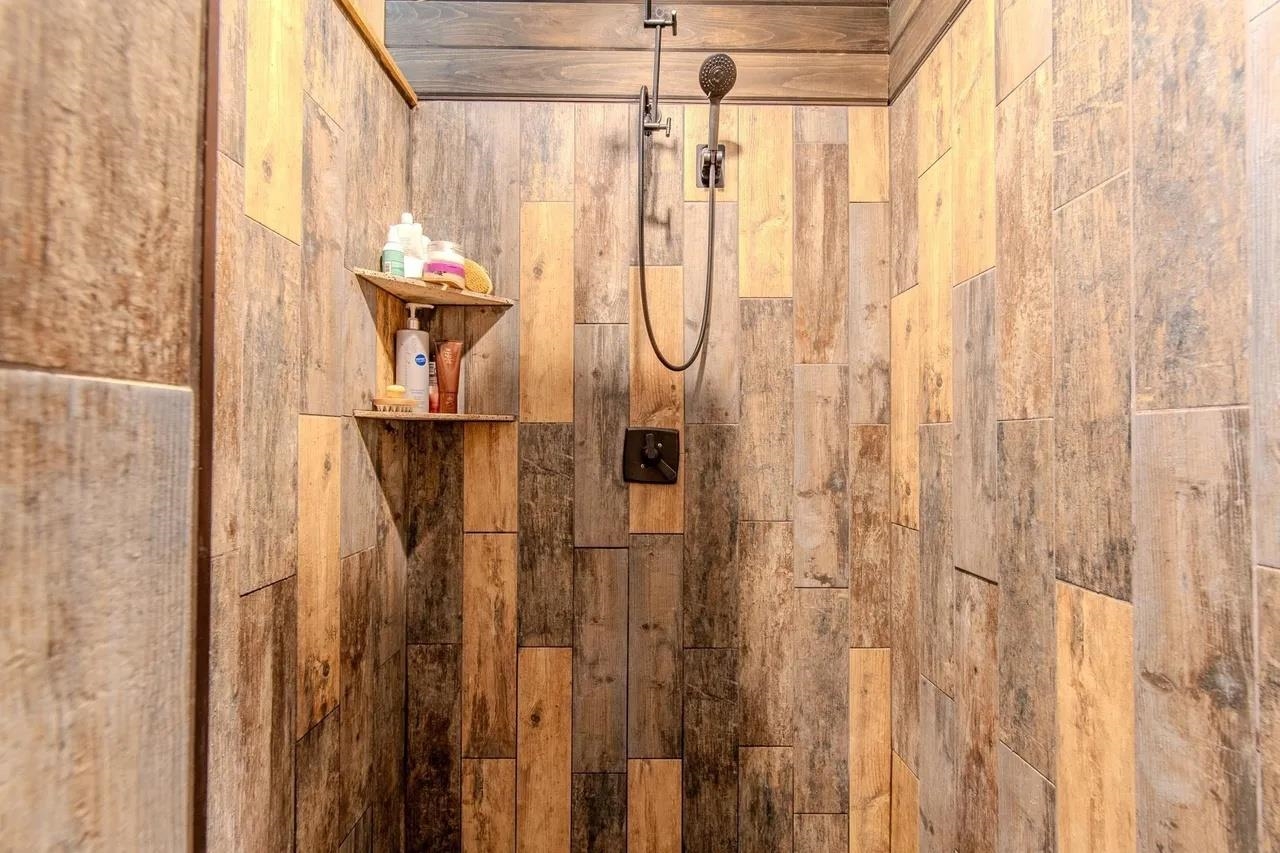 2134 Otis Plunk Road Bethel Springs, TN 38315 - Photo 14 of 35 a bathroom with a shower