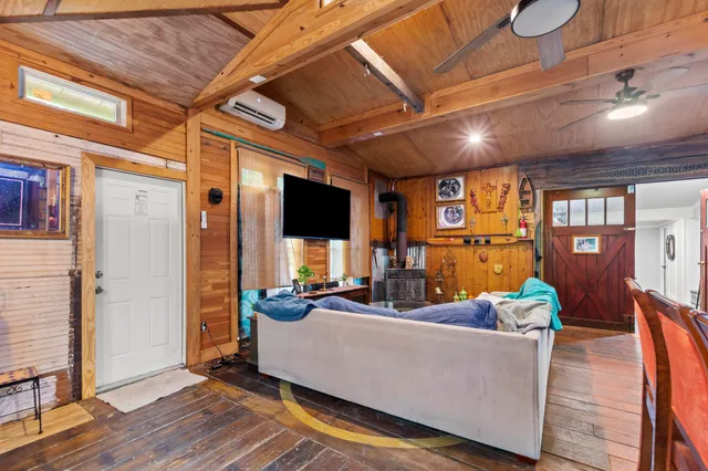 a kitchen with a stove and a refrigerator
