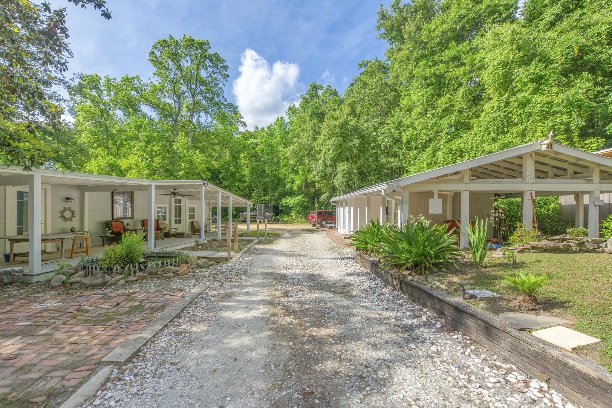 74 West Shell Cracker Road Freeport, FL 32439 - Photo 21 of 40 a front view of a house with garden