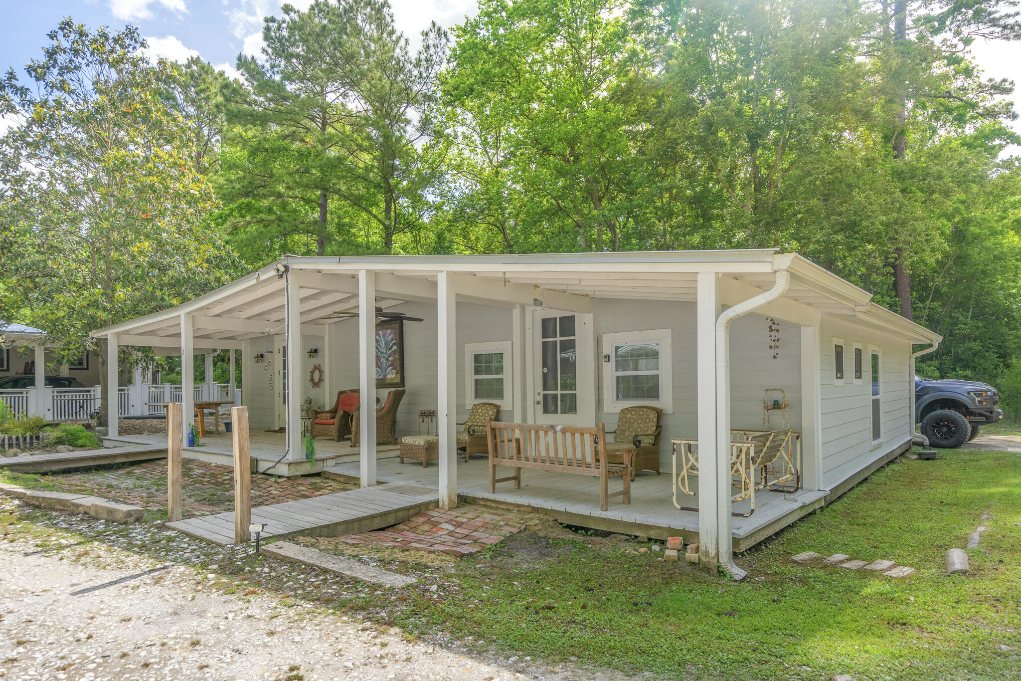 74 West Shell Cracker Road Freeport, FL 32439 - Photo 23 of 40 a view of a house with a yard balcony and garden