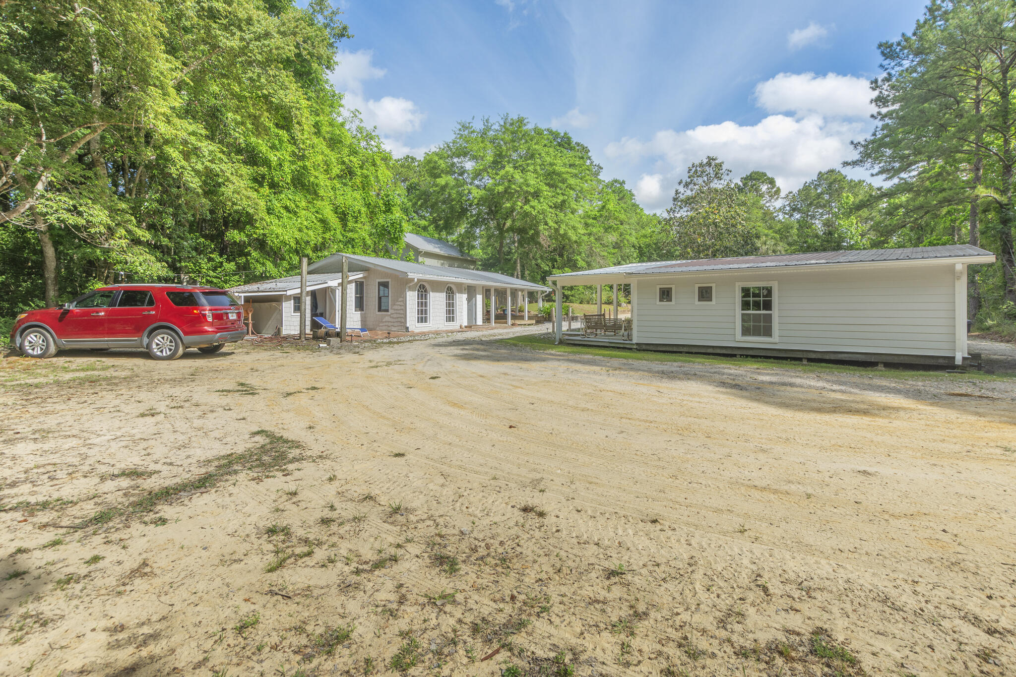 74 West Shell Cracker Road Freeport, FL 32439 - Photo 30 of 40 a view of a house with a yard