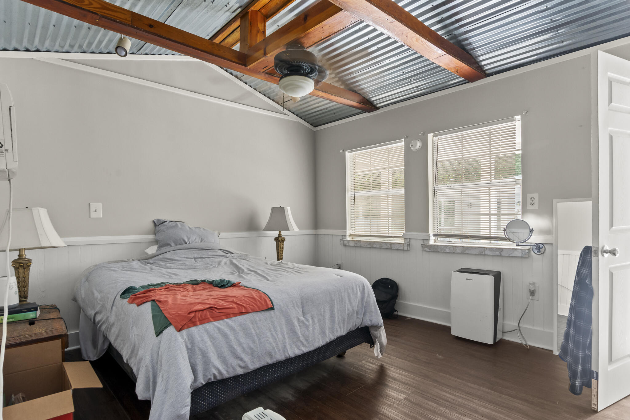 74 West Shell Cracker Road Freeport, FL 32439 - Photo 37 of 40 a bedroom with a bed and a large window