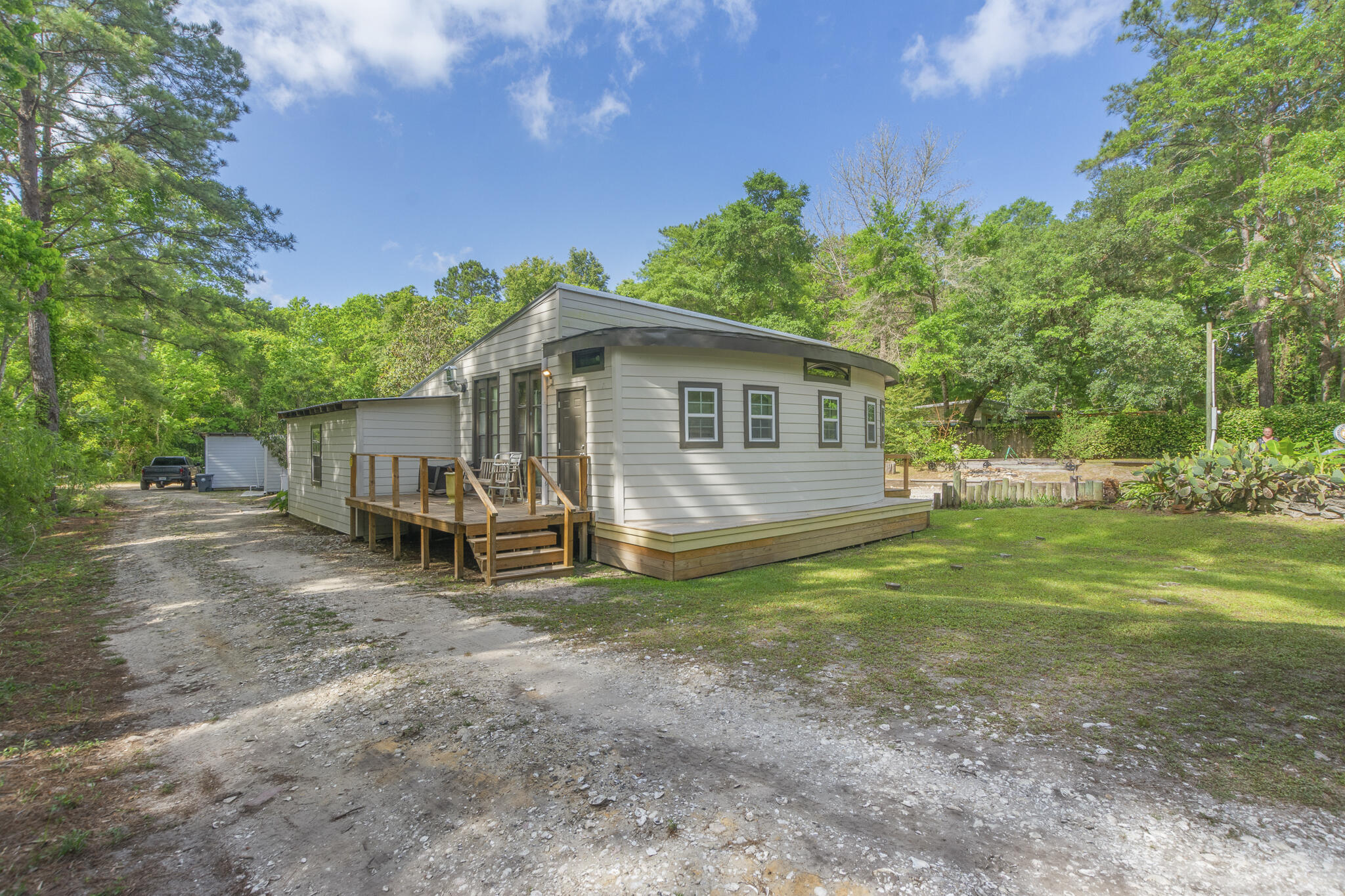 74 West Shell Cracker Road Freeport, FL 32439 - Photo 5 of 40 a view of a house with a yard