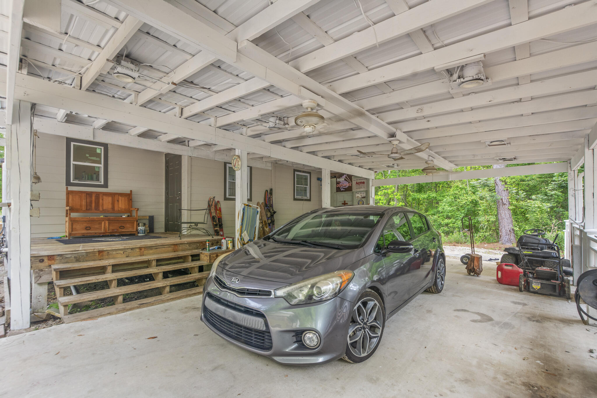 74 West Shell Cracker Road Freeport, FL 32439 - Photo 8 of 40 a car parked in garage