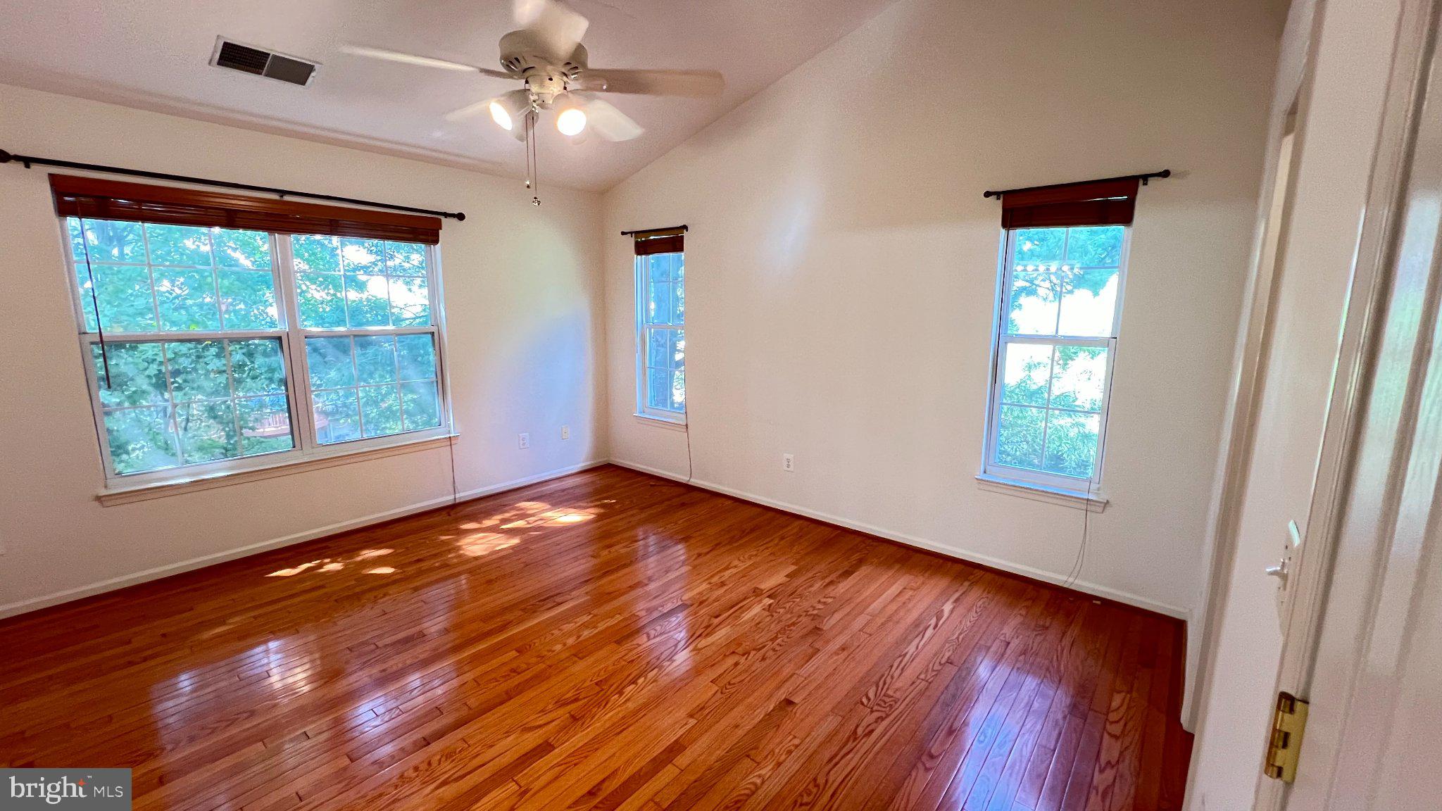 4100 Flower Fairfax, VA 22030 - Photo 23 of 47 a view of empty room with wooden floor and fan