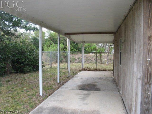 207 Davis Road Lehigh Acres, FL 33936 - Photo 9 of 10 a view of outdoor space and balcony