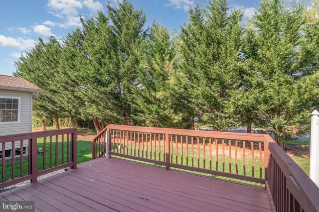 a view of a wooden roof deck