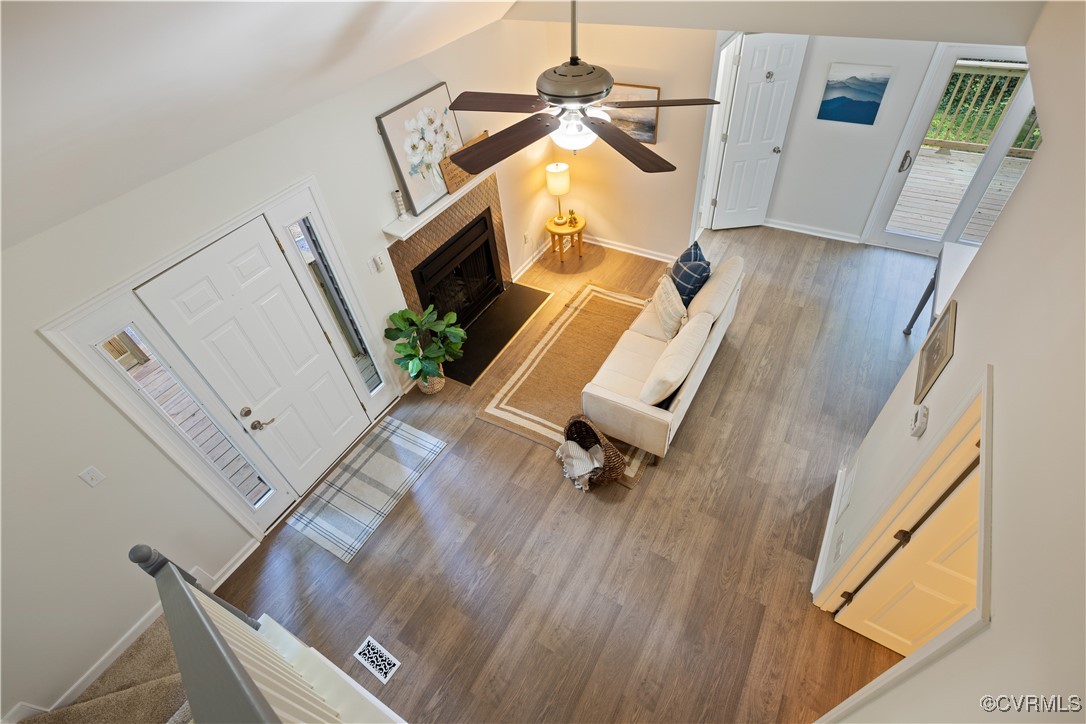 a view of living room with furniture and a flat screen tv