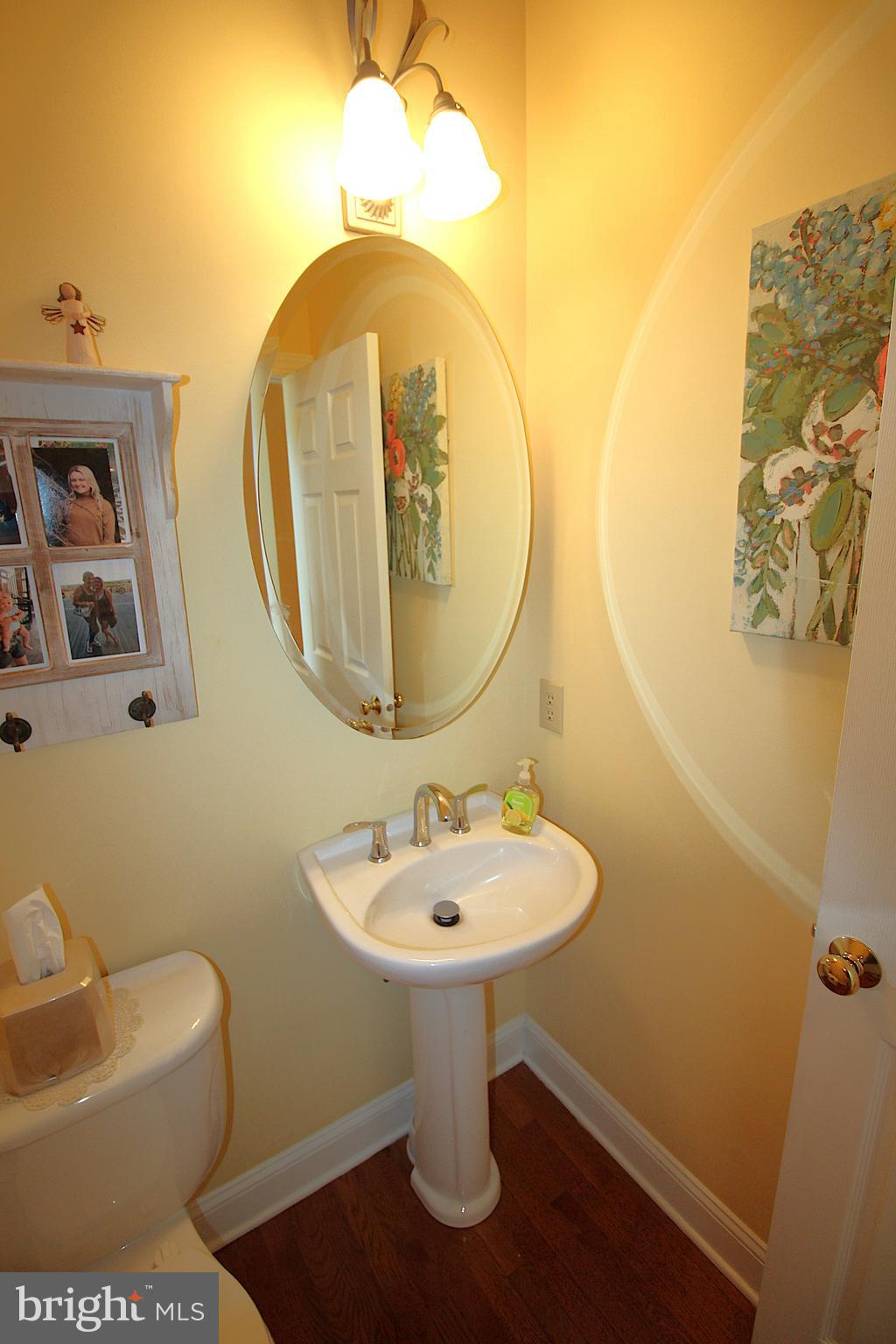 193 Curley Mill Road Chalfont, PA 18914 - Photo 11 of 49 a bathroom with a toilet sink and mirror