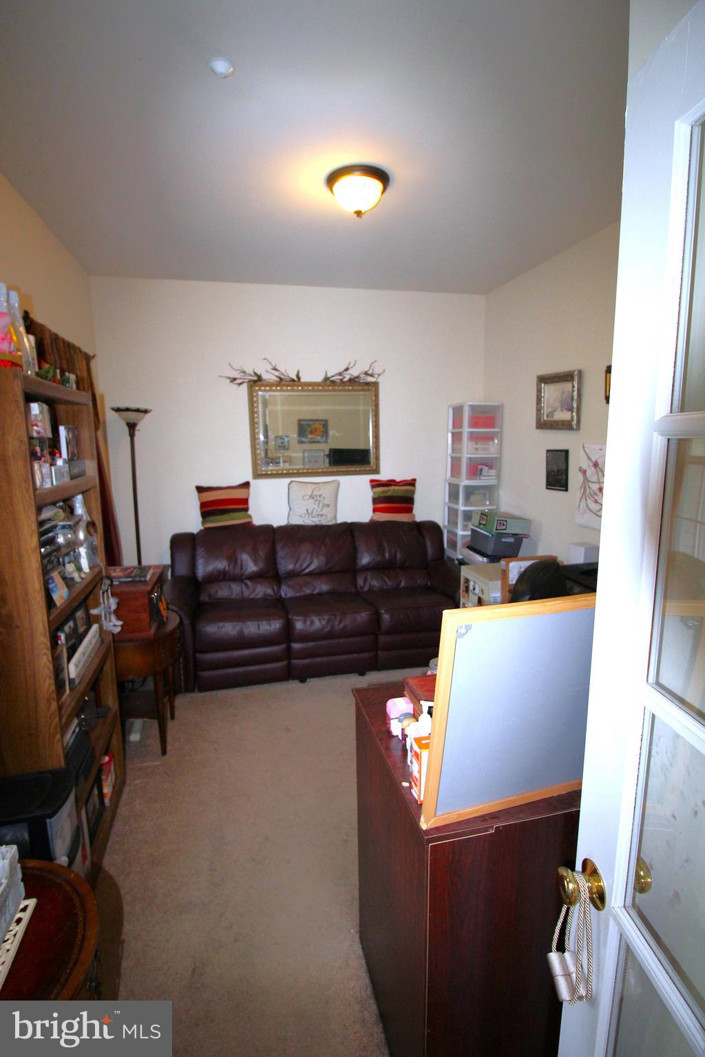 193 Curley Mill Road Chalfont, PA 18914 - Photo 14 of 49 a living room with furniture and a flat screen tv