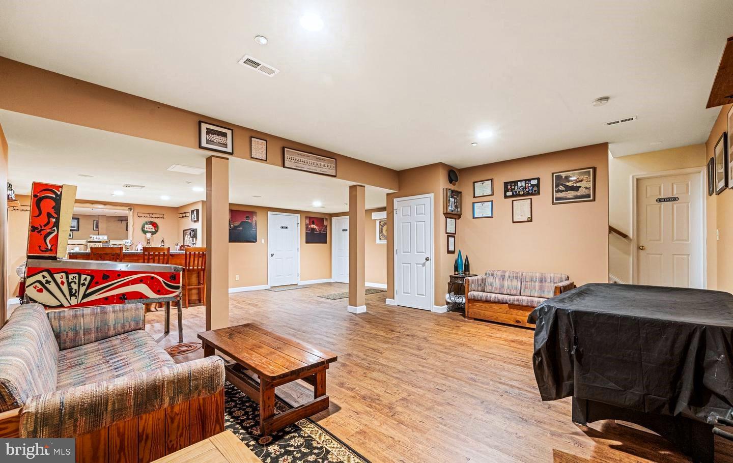 193 Curley Mill Road Chalfont, PA 18914 - Photo 16 of 49 a living room with furniture and wooden floor