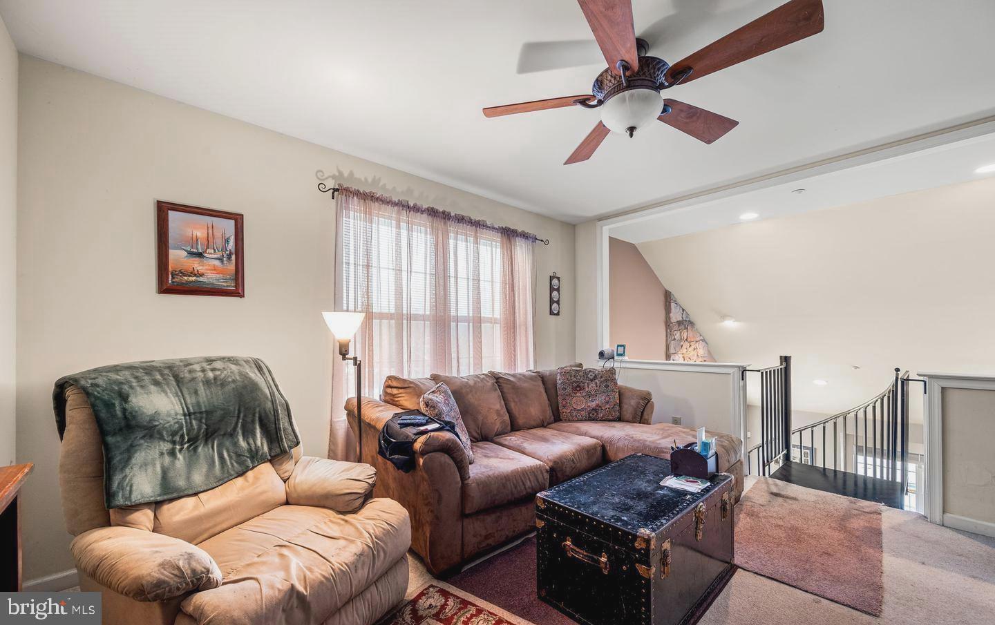 193 Curley Mill Road Chalfont, PA 18914 - Photo 26 of 49 a living room with furniture and a large window