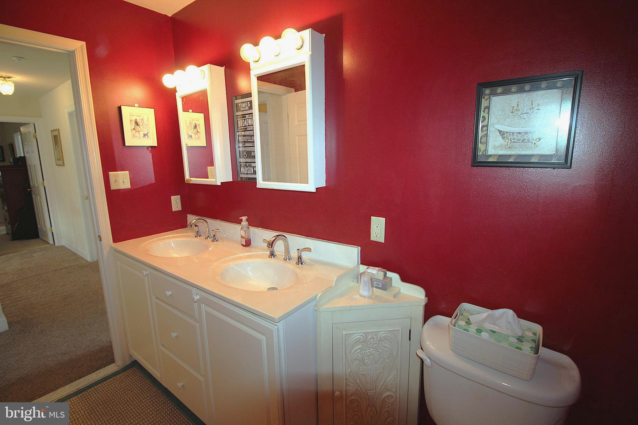 193 Curley Mill Road Chalfont, PA 18914 - Photo 31 of 49 a bathroom with a granite countertop toilet sink and mirror
