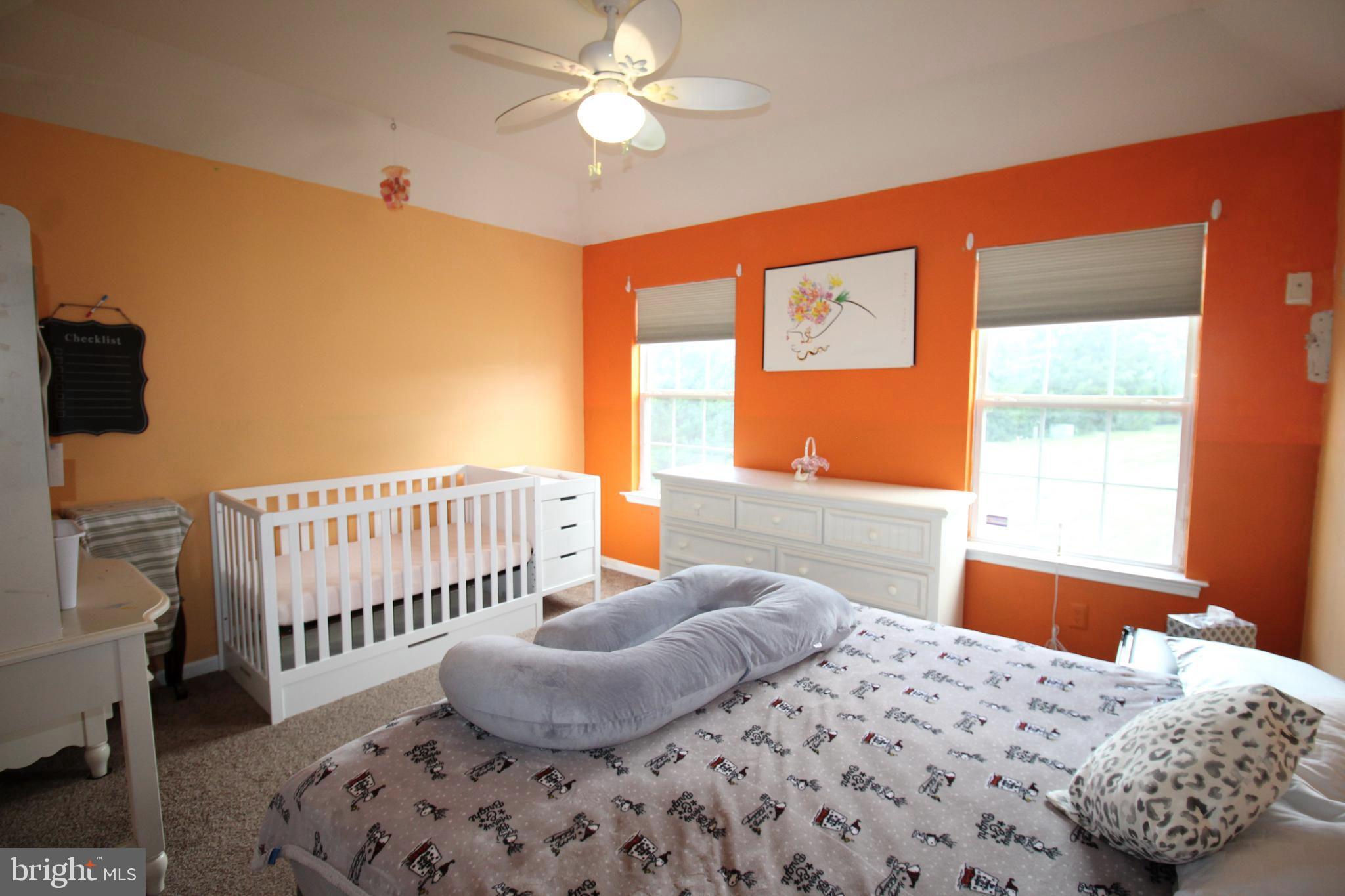 193 Curley Mill Road Chalfont, PA 18914 - Photo 32 of 49 a bedroom with a bed and a window