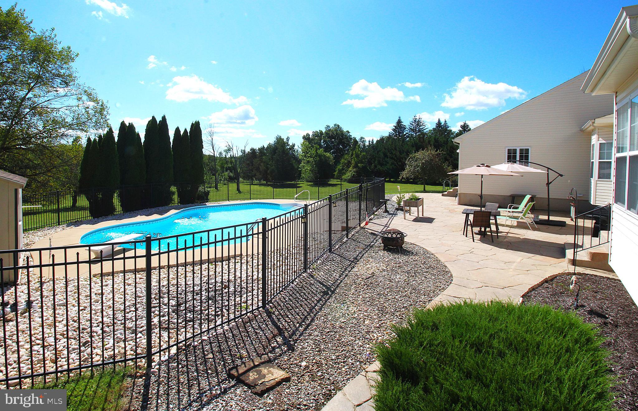 193 Curley Mill Road Chalfont, PA 18914 - Photo 47 of 49 a view of a backyard with sitting area