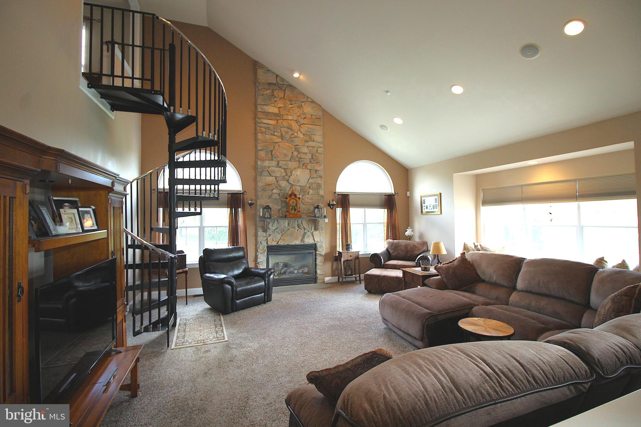 193 Curley Mill Road Chalfont, PA 18914 - Photo 10 of 49 a living room with furniture and a flat screen tv