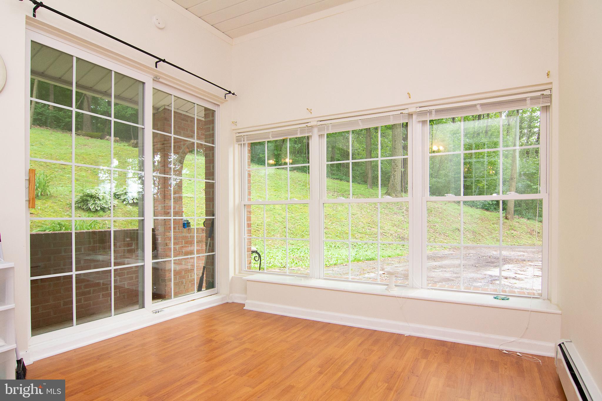 1439 Ridge Road Westminster, MD 21157 - Photo 14 of 37 Tons of light in this laundry room w/sliding doors